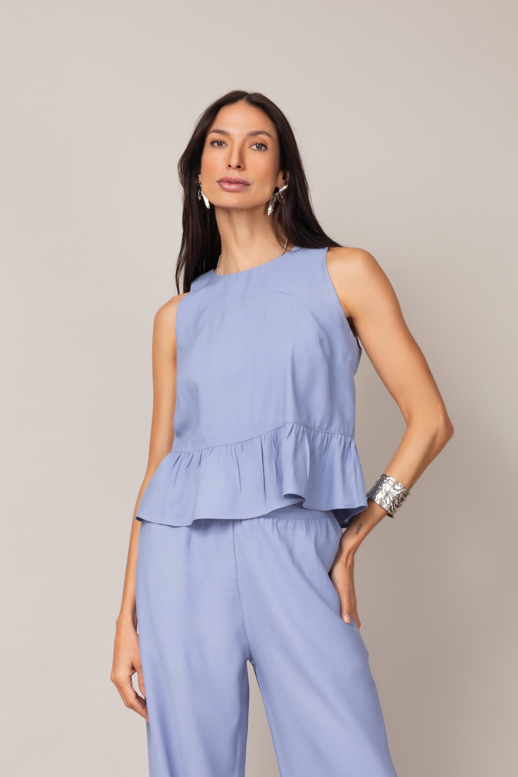 Conjunto com Blusa Peplum e Calça Pantalona